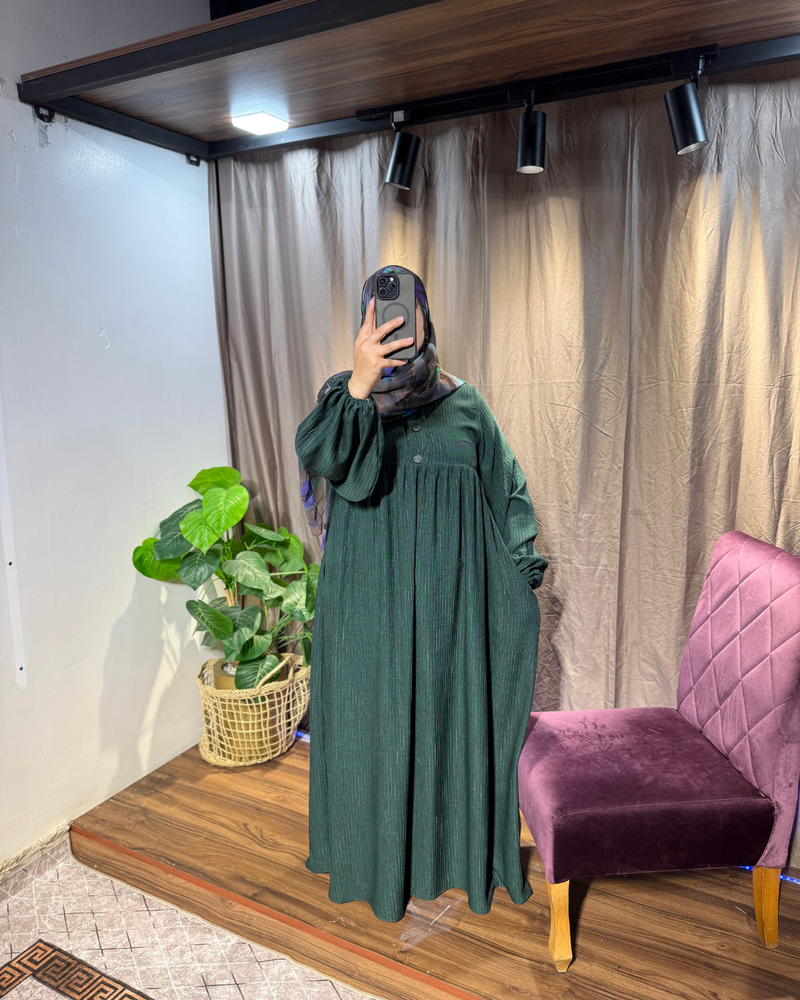 عباءة يسرى